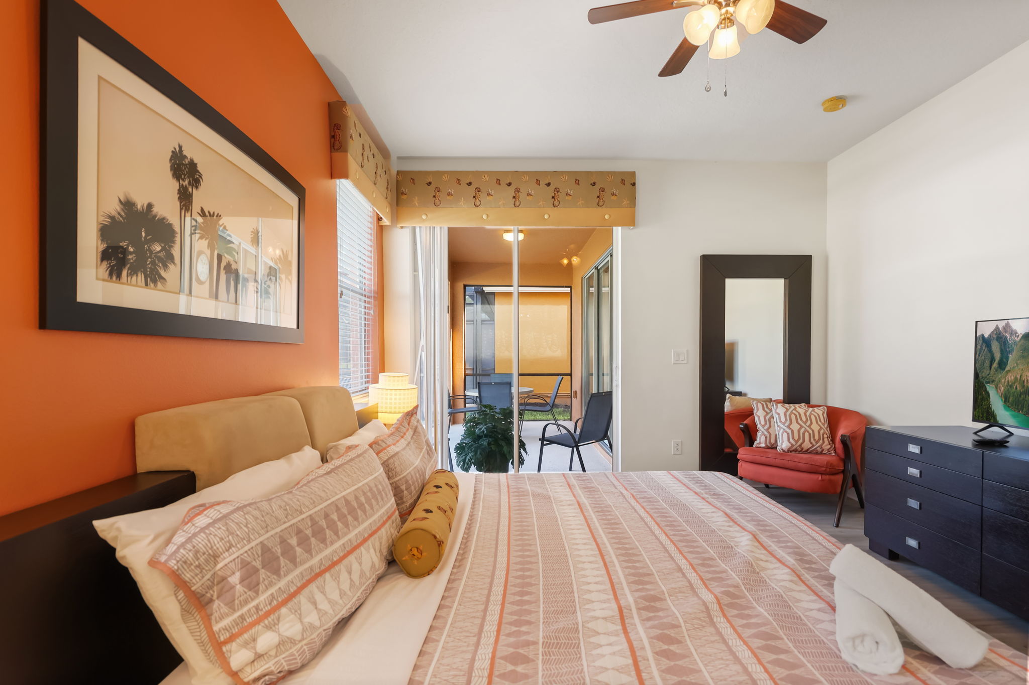 Primary bedroom with direct access to the screened pool